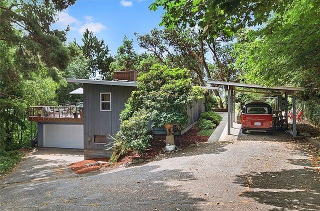 Welcome Home.  Stunning 1954 Mid-Century on your own secluded lo