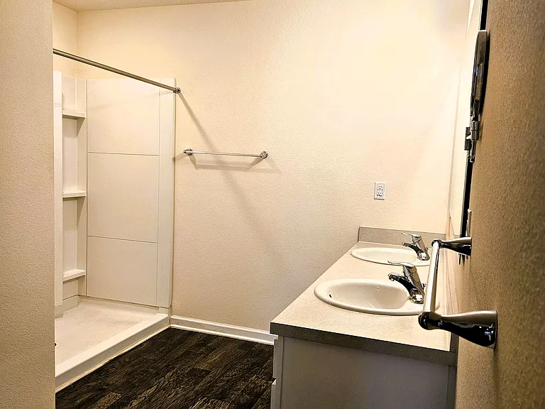 Vanity to walk-in bath view