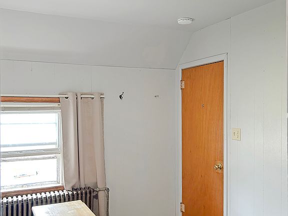 We've recently added a couch and mounted the TV on the wall. This is a small 1 bedroom unit but it still has a full kitchen, entry, couch with TV