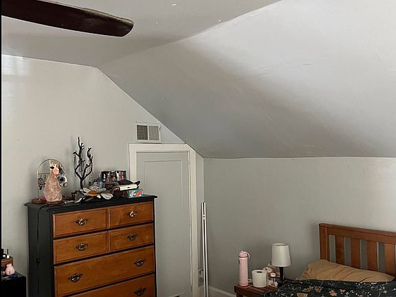 Bedroom fits queen bed. Storage area to the right of dresser (large...goes way back.) Also has a closet.