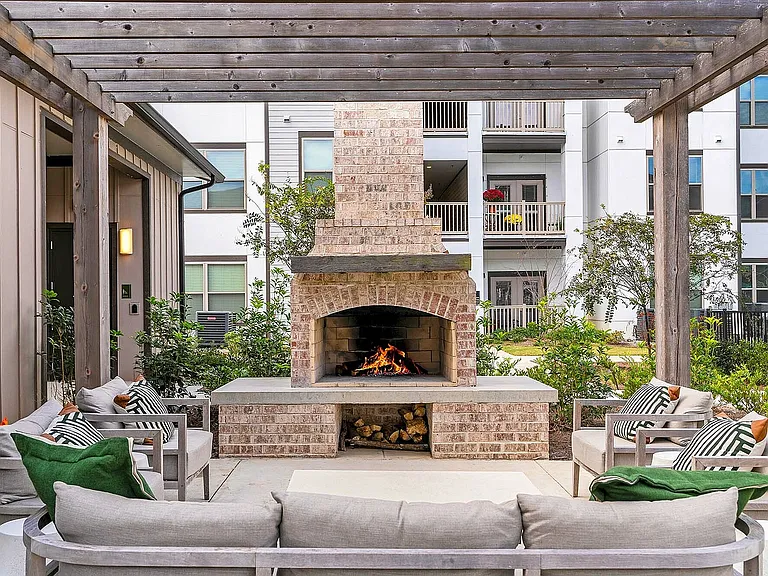 Relax and unwind in this charming outdoor living area, perfect for gatherings.