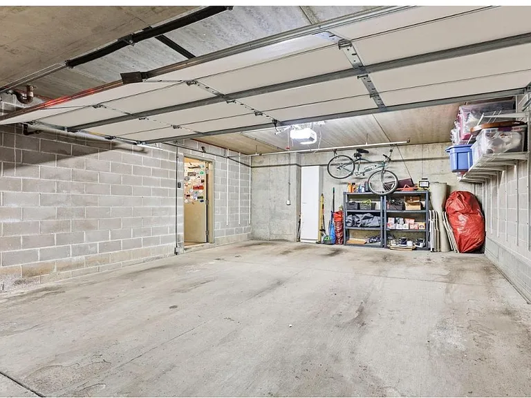 Two car garage with separate garage door for extra security