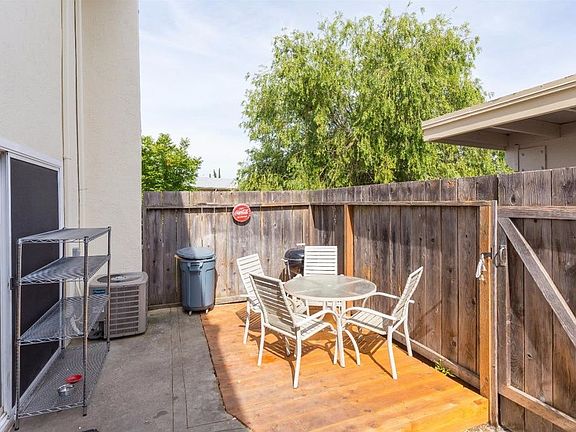 charming backyard with a shed for storage