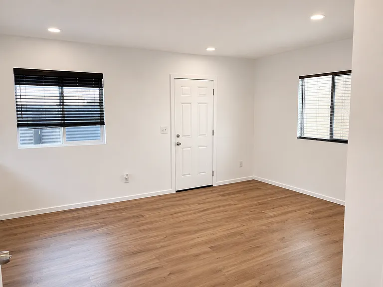View from the hall way to the Entrance: Living room