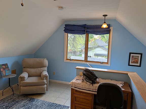How about a sitting area near the large window?