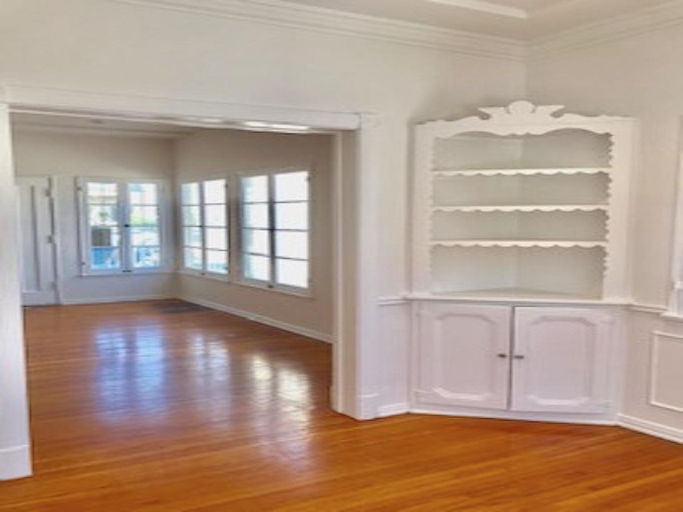 Dining area with hardwood floors and vintage features