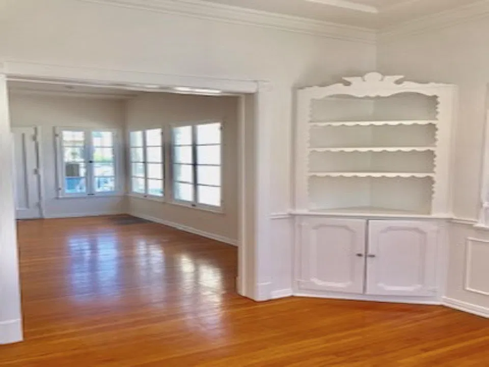 Dining area with hardwood floors and vintage features