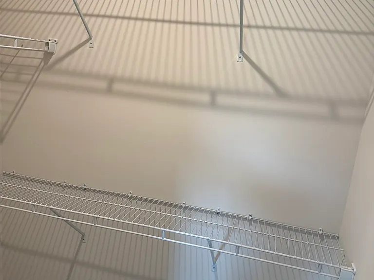 Bedroom 2: Wire shelves