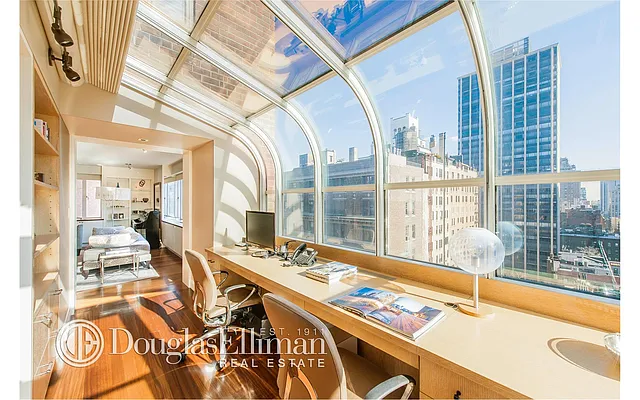 Sold by Douglas Elliman | media 13