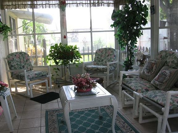 Spend your days in this lovely Sunroom!