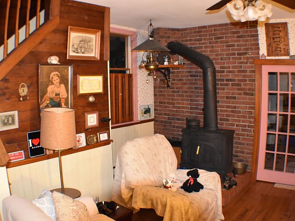 DEN - wood stove on BRICK