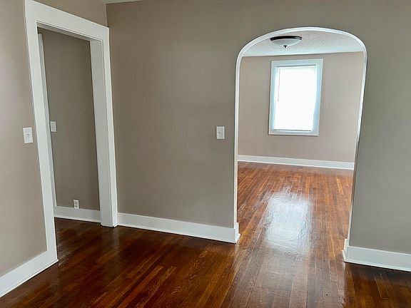 Dining room looking into living room. Turn left to bedrooms.