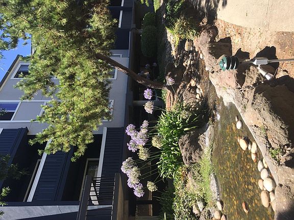 the entrance to the apt. door in bk of pic