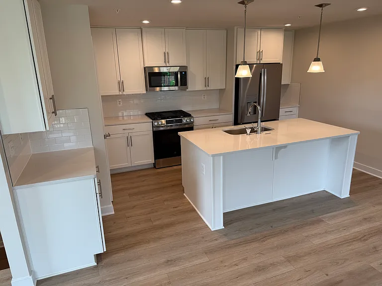 Shared kitchen. French style fridge. Gas range/oven. Dishwasher quiet/easy to use/clean.