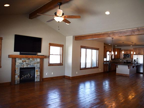 Great Room with Gas Fireplace. TV has been removed and not included.