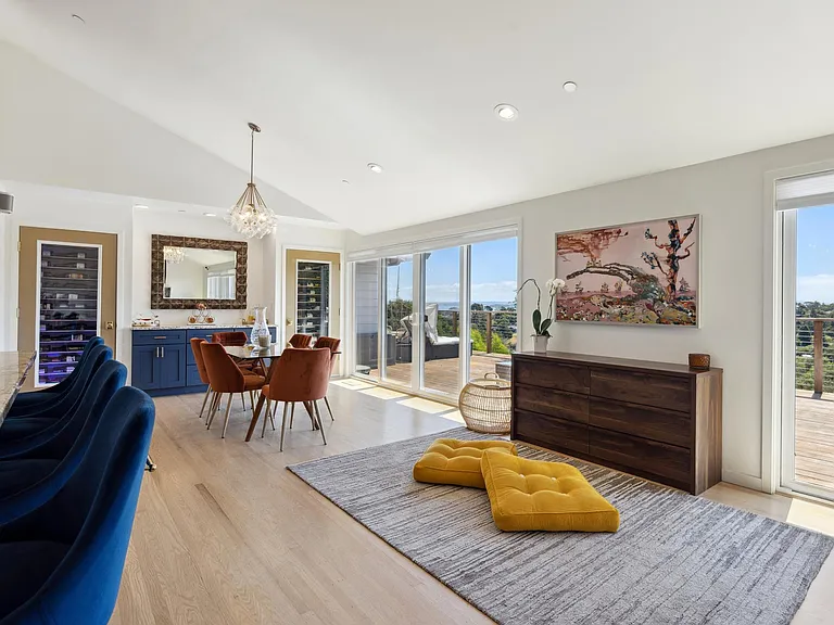 Living, island, dining, bar w/custom wine cellars