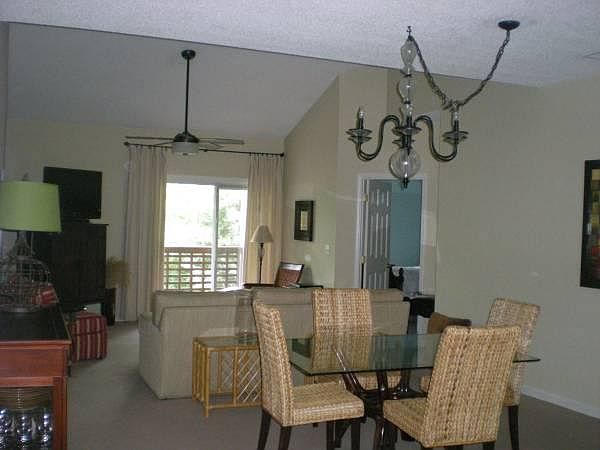 Large living room/dining room with balcony