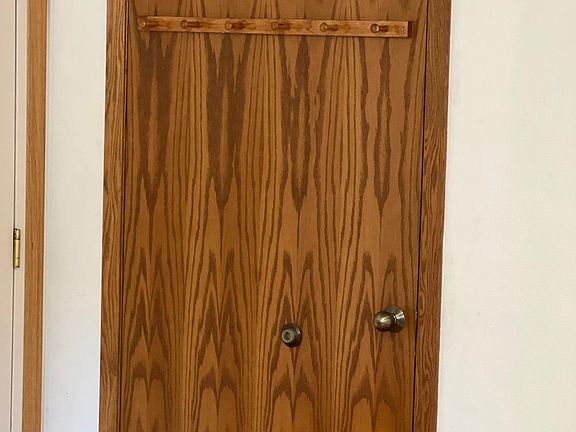 hot water heater and new furnace behind this door