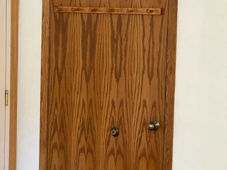 hot water heater and new furnace behind this door