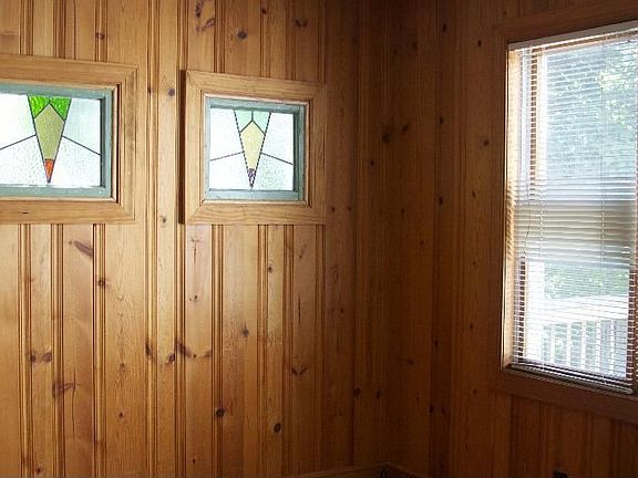 DR standing at Fireplace