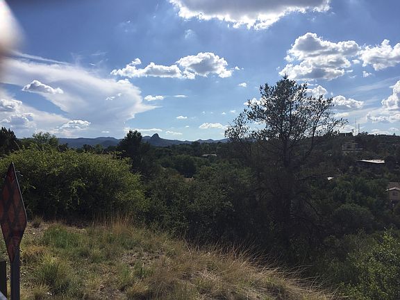 Thumb Butte , forest behind 