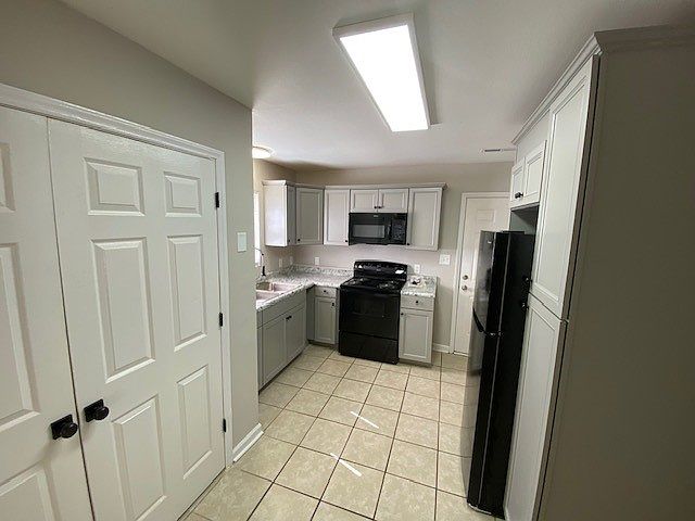 Kitchen with new cabinets, all new appliances, new countertop, new plumbing fixtures and new lighting
