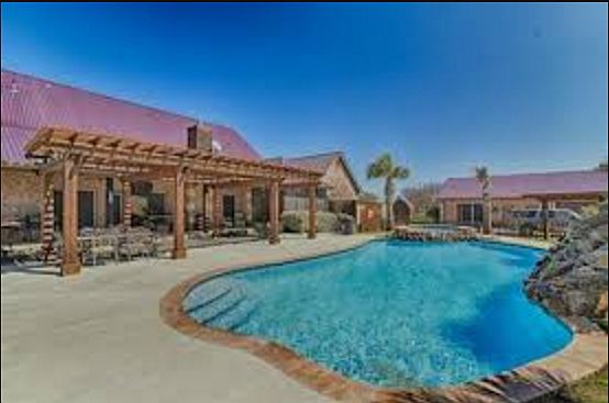 Resort pool, spa, waterfall