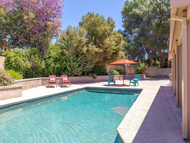 So many gorgeous trees create so much privacy in this backyard!
