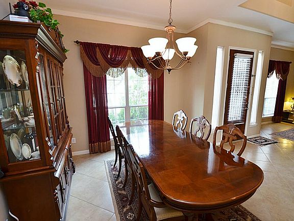 Spacious formal dining room to the right of the foyer.