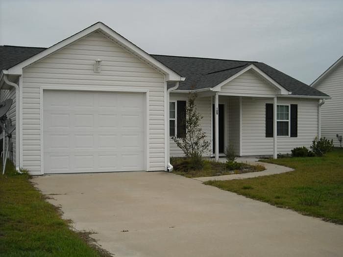 FRONT VIEW (driveway has been widened on left to allow 2 cars)