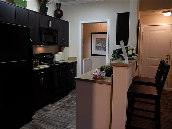 Black forest cabinets, granite inspired counters, and modern