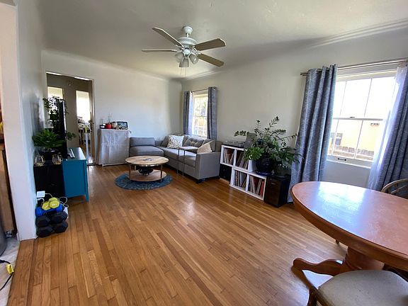 Living/dining area. Hardwood floors and lots of light.