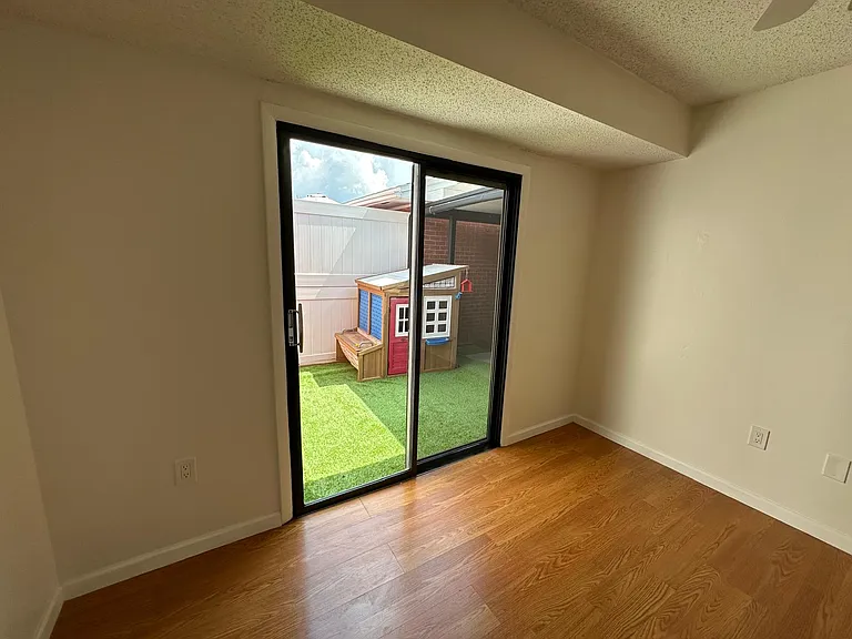 MASTER BEDROOM,
OUTSIDE VIEW FROM SLIDING DOOR.
