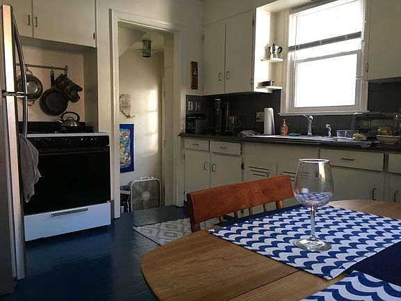 Kitchen, floor is now clear hardwood.