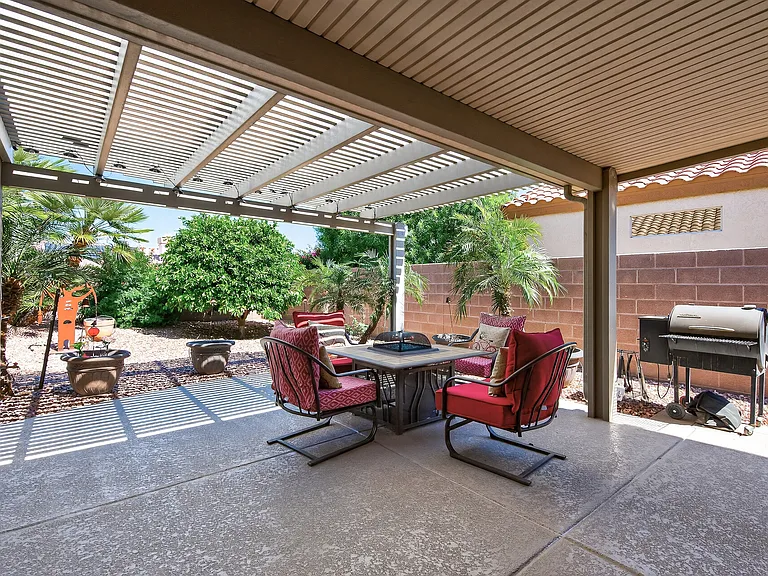 Yes, that is a fire table and there is a shade over there between the two homes to shield the sun