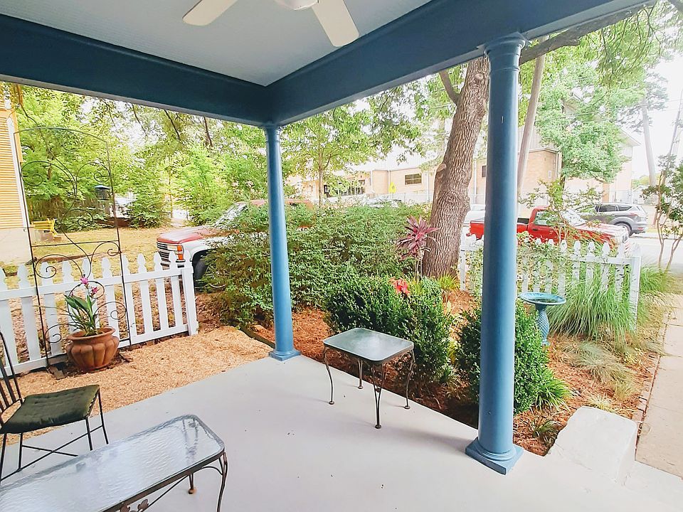 Cosy shared front porch to watch the world go by.