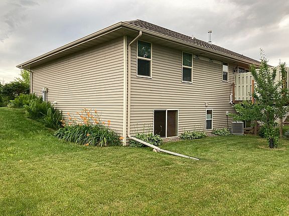 Sloped yard for large window