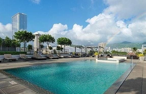 Pool w/ jacuzzi and firepit nearby.