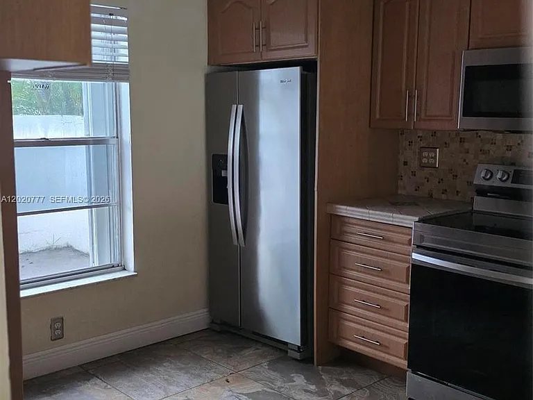 3912 SW 67th Ter #114 — Photo 3