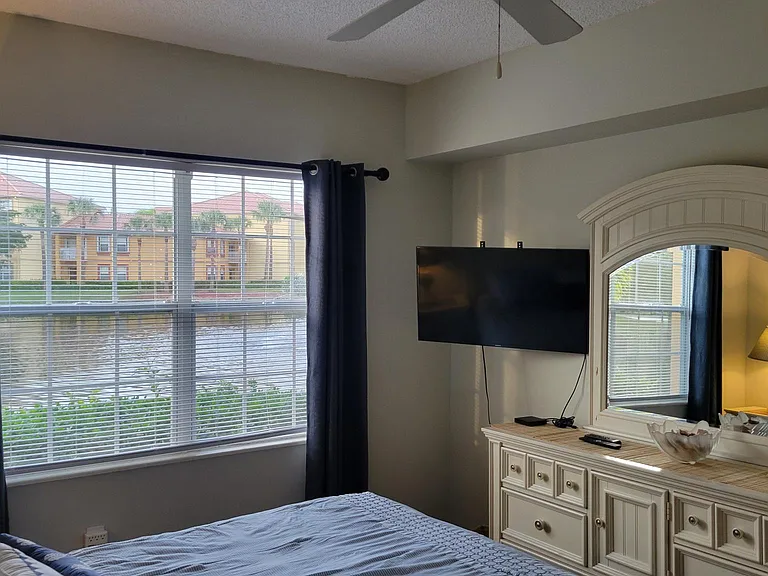 Beautiful lake view through the window. Enjoy evenings with a smart TV