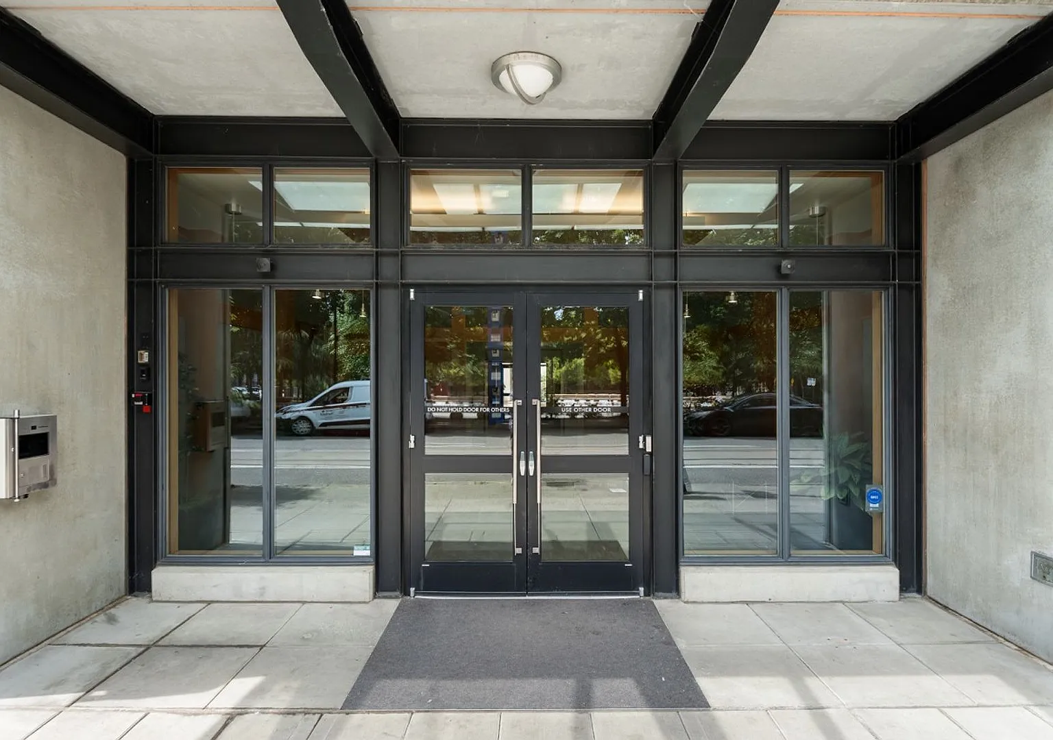 Ground-Floor Corner 2BR + Den at Riverstone Private Courtyard Entrance & Terrace (Pearl District) — Photo 2
