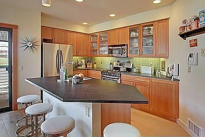 Massive eating/prep counter made of rough granite-thought to be first residential installation of th