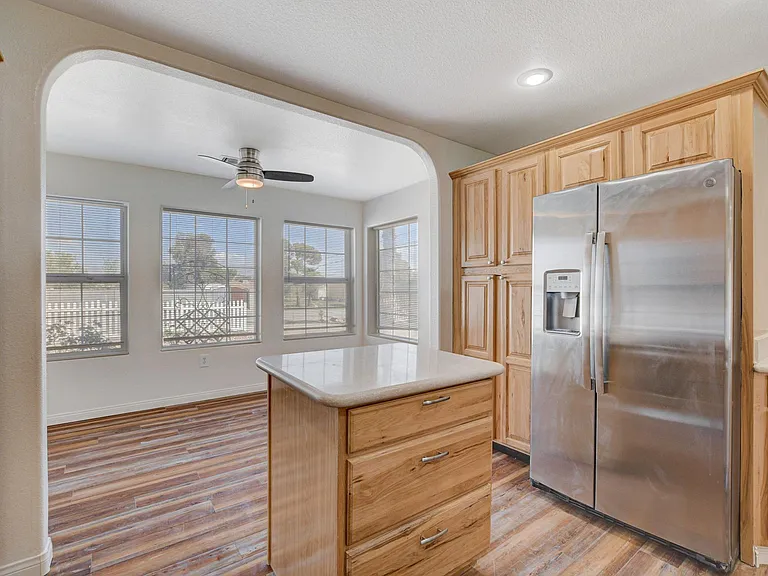 Sunny breakfast nook and small kitchen island
