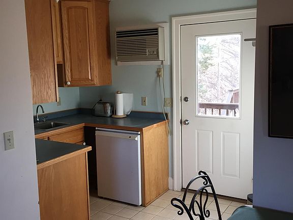 Kitchenette, private entrance and dining space.