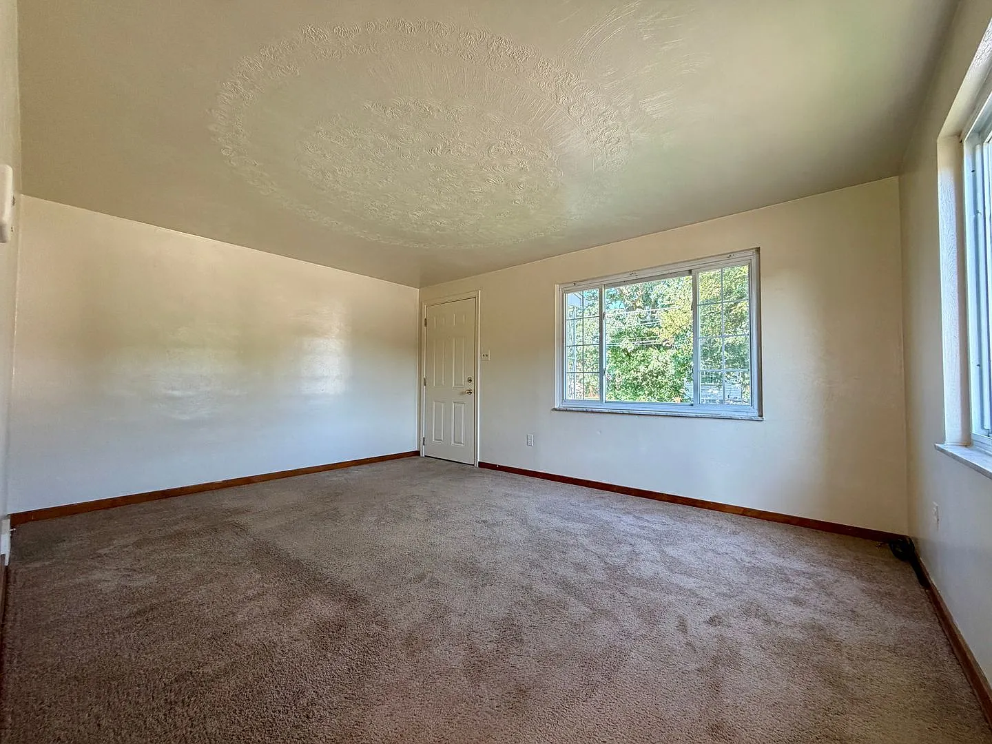 Charming Two Bedroom Townhome with a Private Basement & a Shared Backyard Space! Call Today! — Photo 3