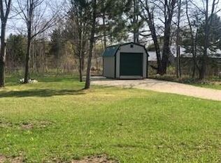 6398 E Gill Rd, Carp Lake, MI 49718