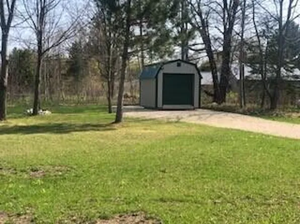 6398 E Gill Rd, Carp Lake, MI 49718