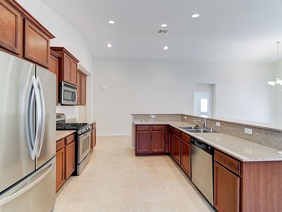 5th image of 6117 Riverwalk Falls St