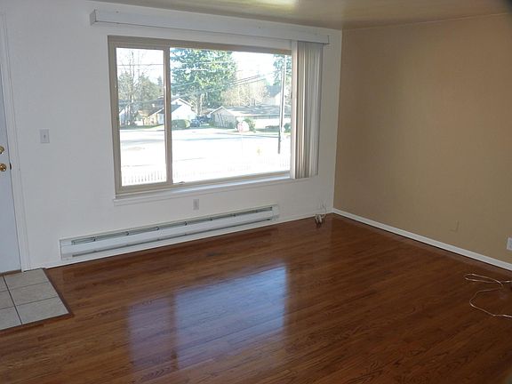 Hardwood floor and huge window