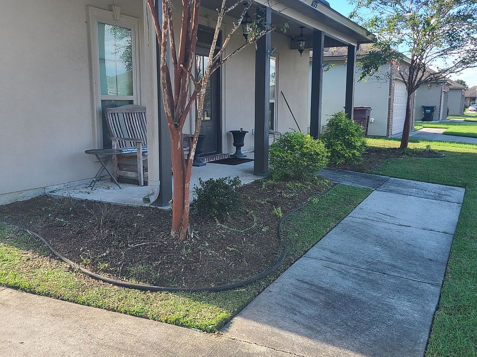 Exterior Front. Sidewalk front entrance